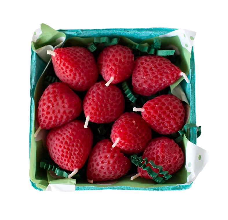 Set of 10 handcrafted strawberry-shaped beeswax birthday candles in rustic berry basket
